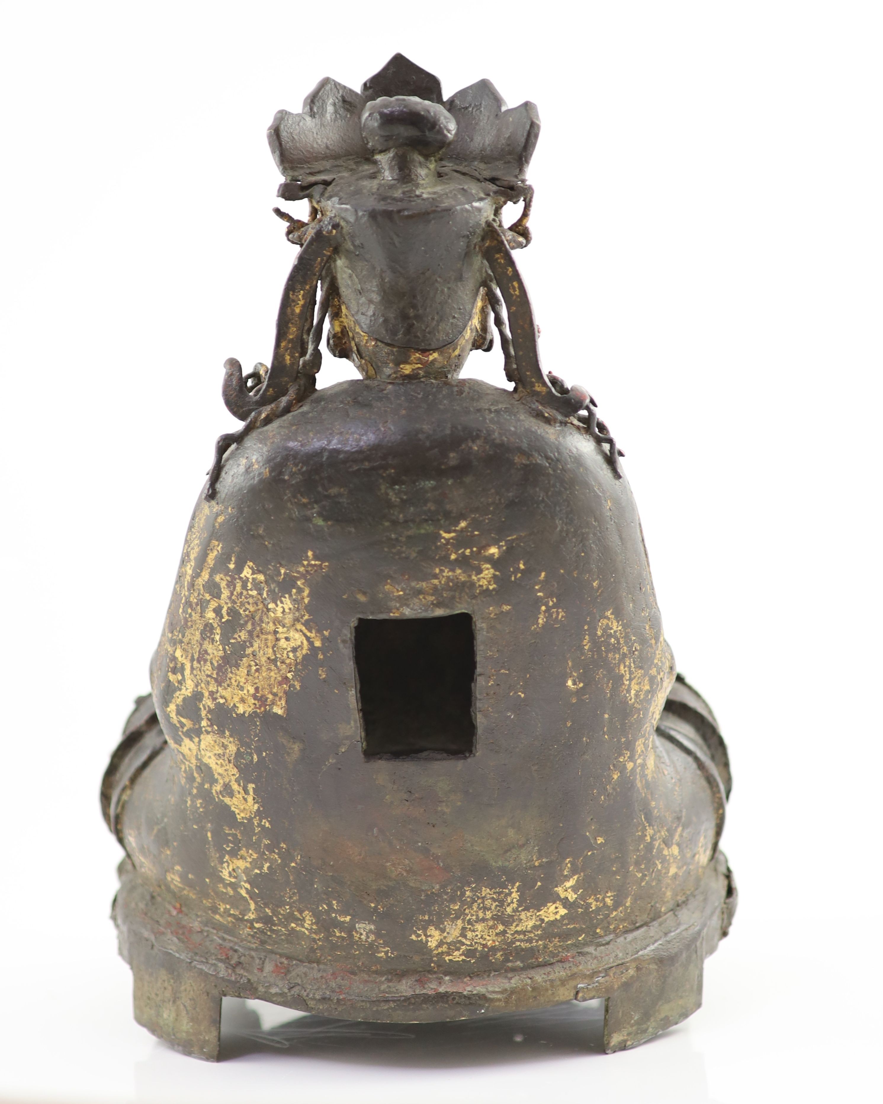 A large Chinese Ming bronze figure of a Bodhisattva, 16th/17th century, 41.5cm high, minor losses